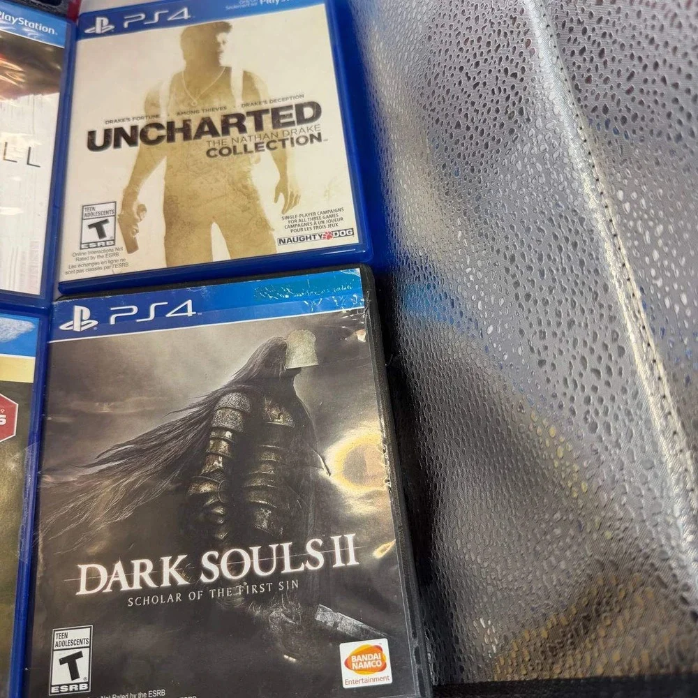 PS4 Game Bundle 7 Games Dark Souls III The Last of Us Uncharted Killzone